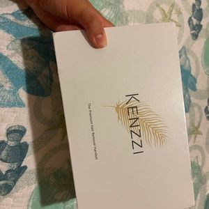 Brand new, wrapped in plastic wrap Kenzzi.